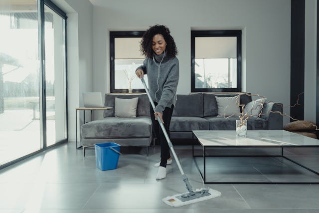 Person mopping a floor